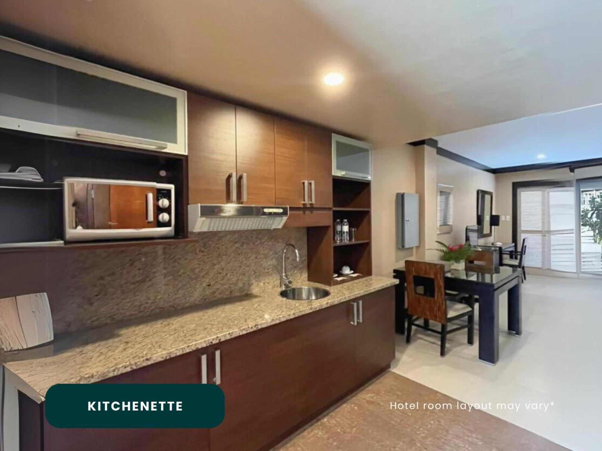 Coralpoint Gardens Suites & Residences Мактан Экстерьер фото