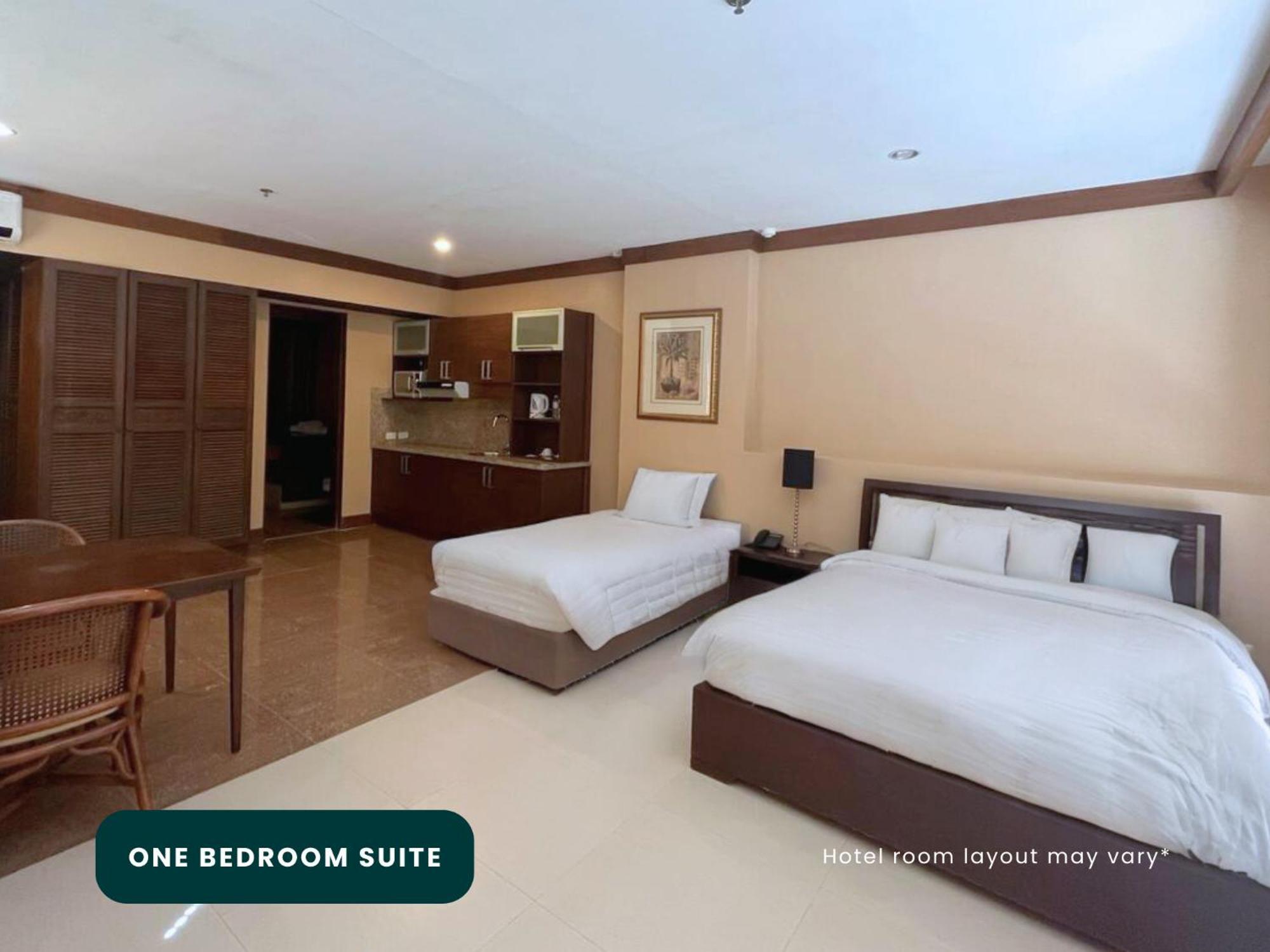 Coralpoint Gardens Suites & Residences Мактан Экстерьер фото